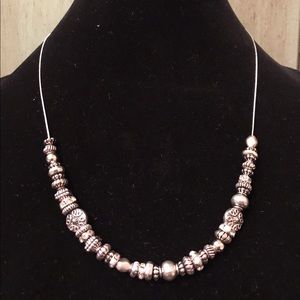 Handcrafted silver trinket necklace